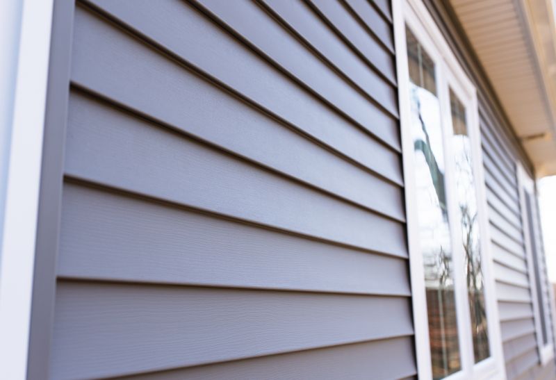 Professional Installing Vinyl Siding